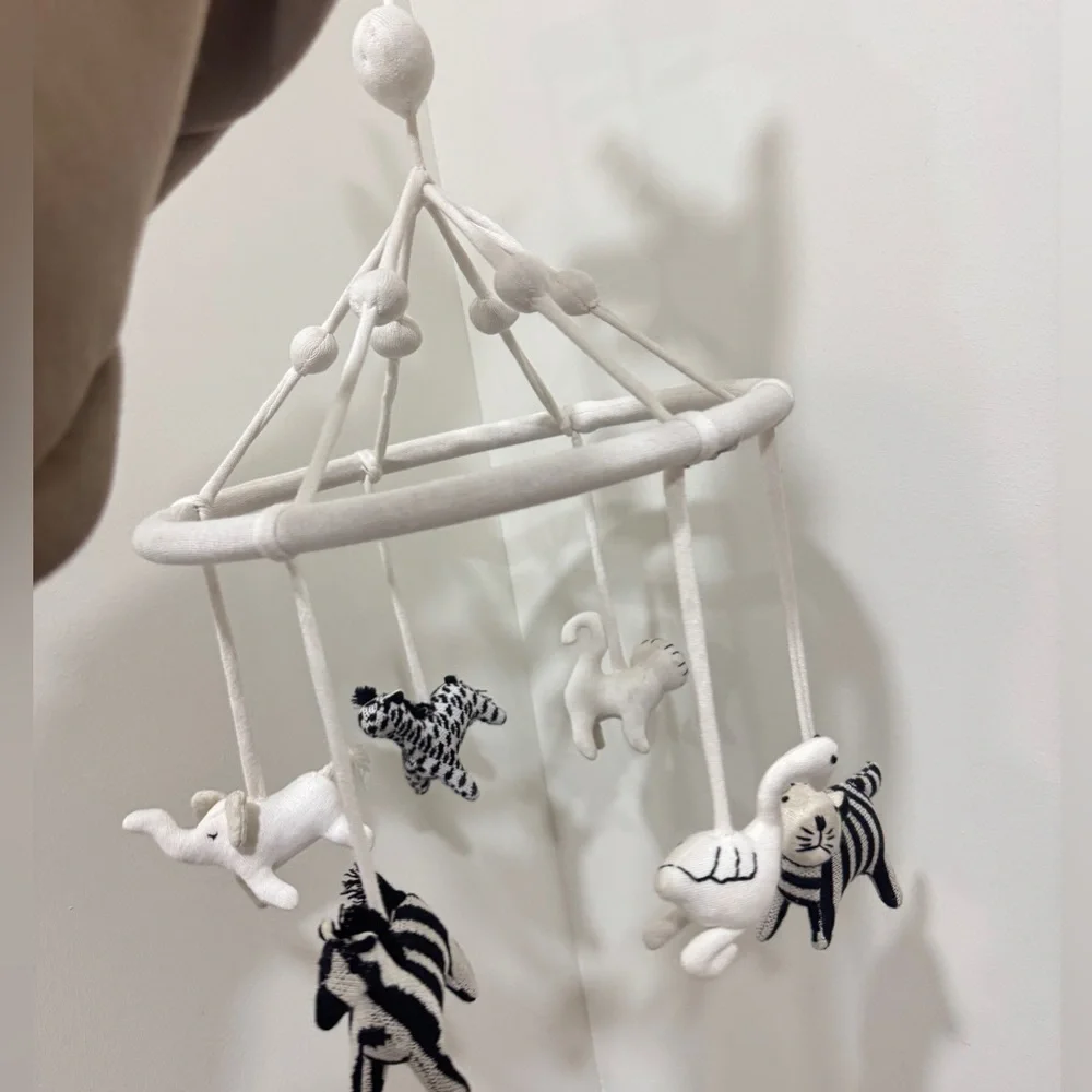 Crate & Barrel Baby Nursery safari animals mobile crib decor newborn neutral